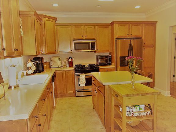 Kitchen has lots of cabinets