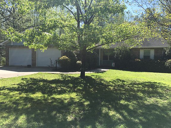 Front of house with garage
