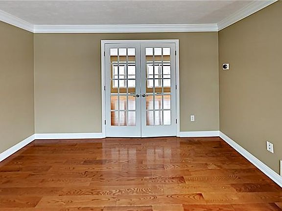 Living room with French doors to family room.