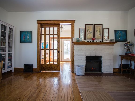 Living room, original door.