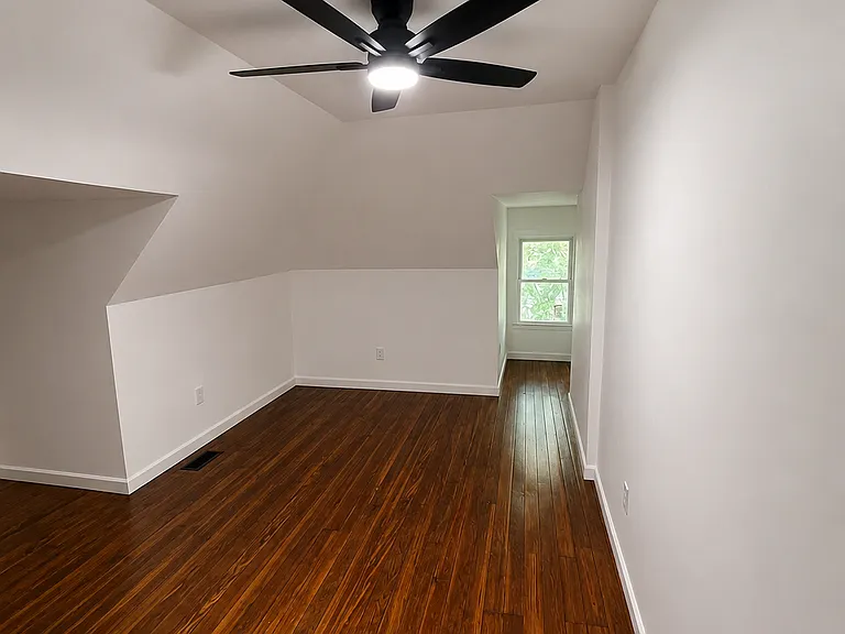 Large third floor suite with bathroom. Can be used as office and/or bedroom.