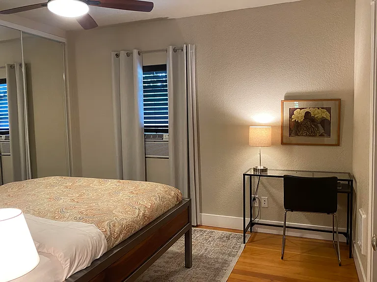 Bedroom. 
Window air conditioning unit