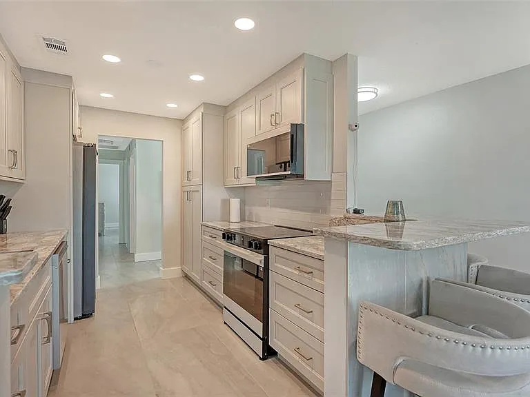 131 Whispering Sands Cir #V-33 — Photo 15