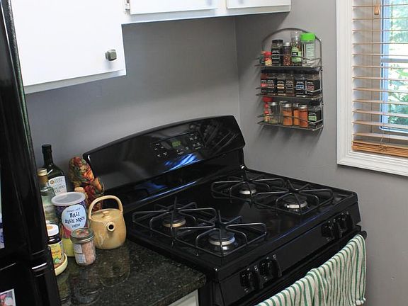 Recently renovated kitchen with granite countertops and new