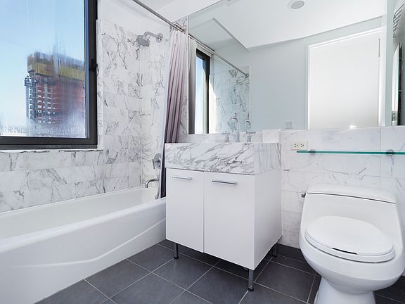 5th image of 9 W 31st St APT 38E