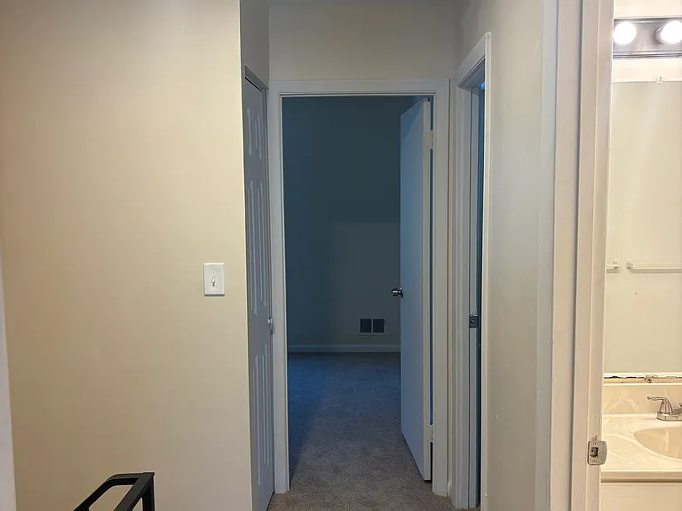 Hallway to 2 other bedrooms