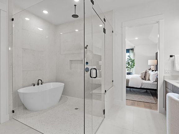 Freestanding Tub in Shower in Primary Bath