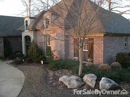 Front-right corner.
						:
						Favorites: The ornamental elm (spring-fall), and the boulders.