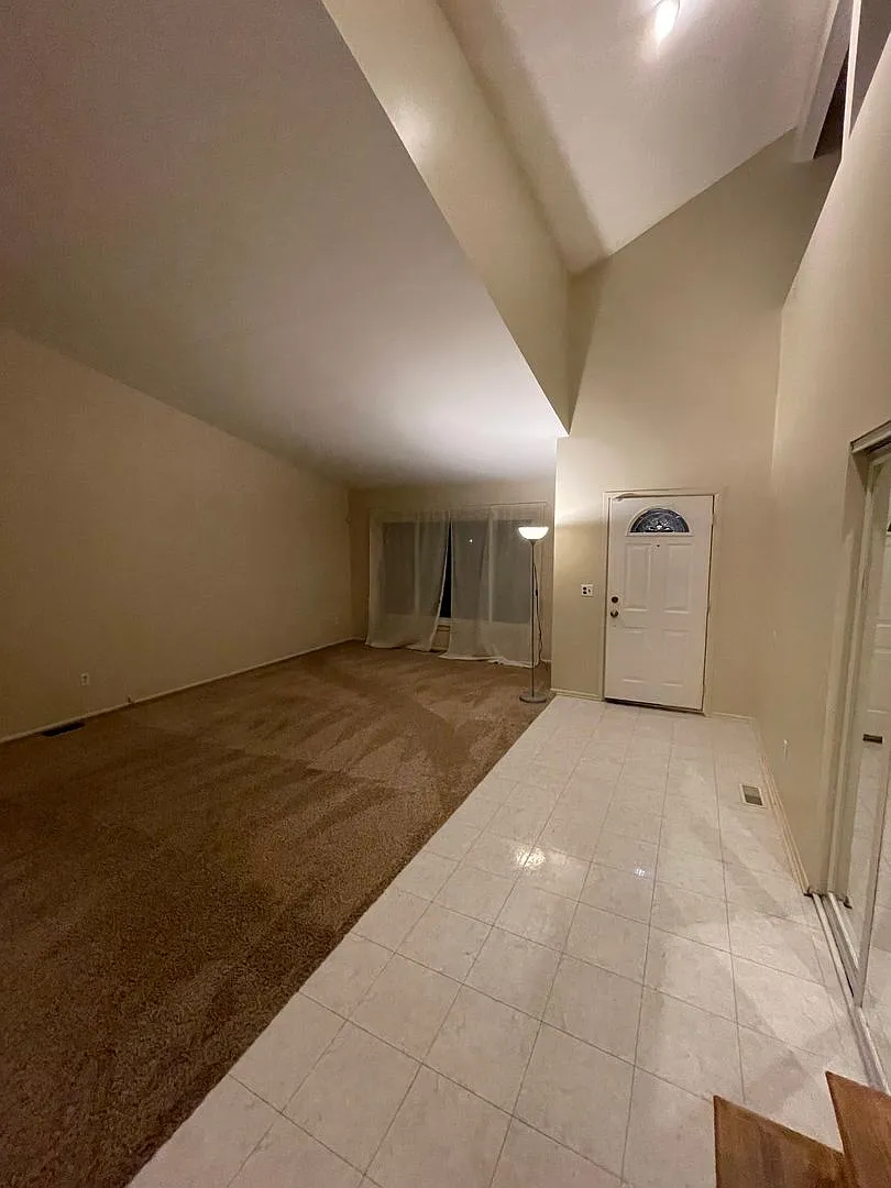 Spacious & Updated Novi Colonial | Vaulted Ceilings, Fireplace & Private Deck — Photo 2
