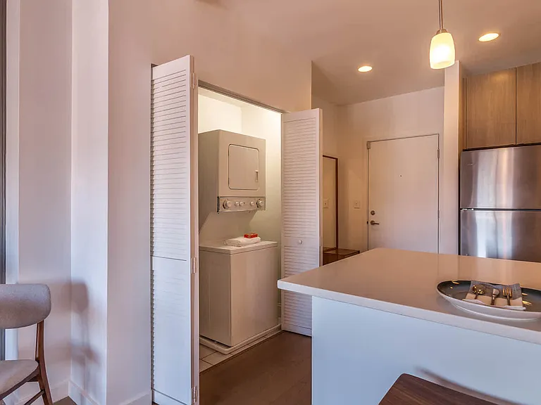 Kitchen with In-home Washer and Dryer
