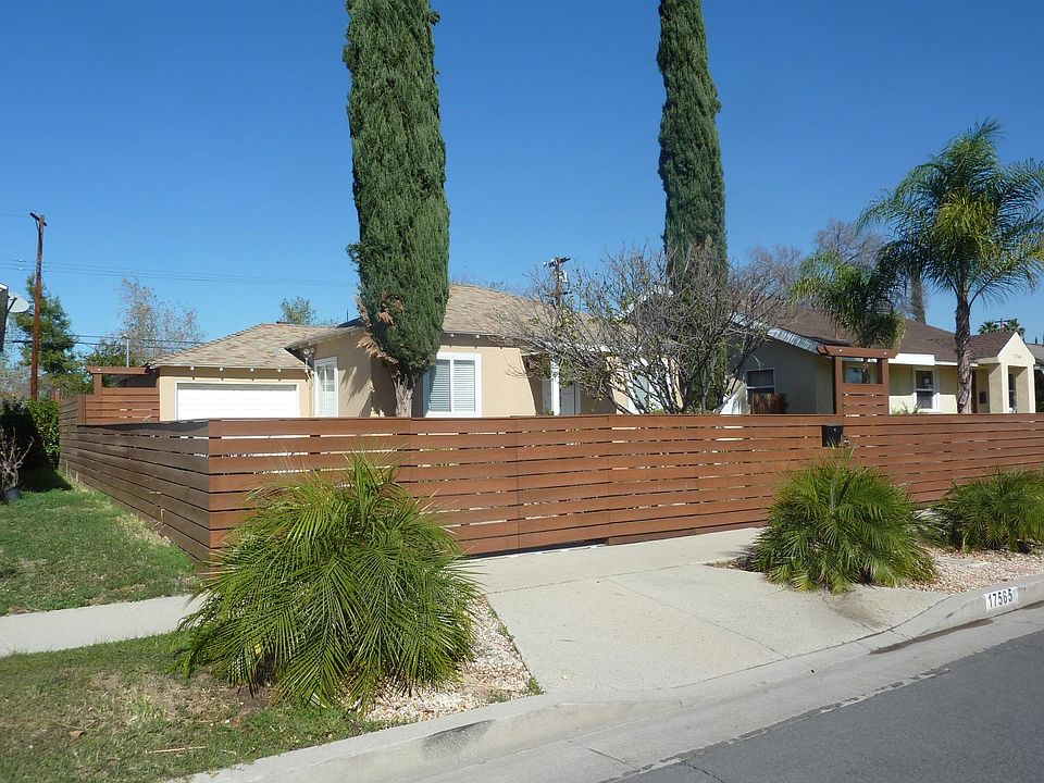 WOOD FENCING ALL AROUND THE PROPERTY