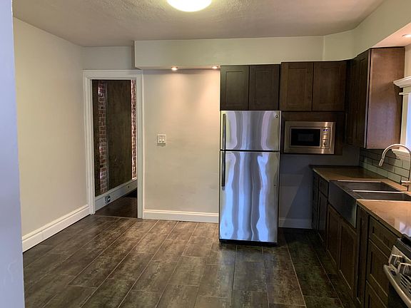 Kitchen leading to hallway