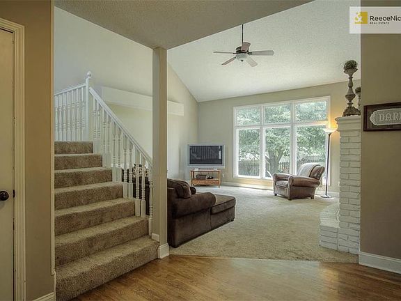Front entry looking left into Great Room - door to basement is just to left of staircase