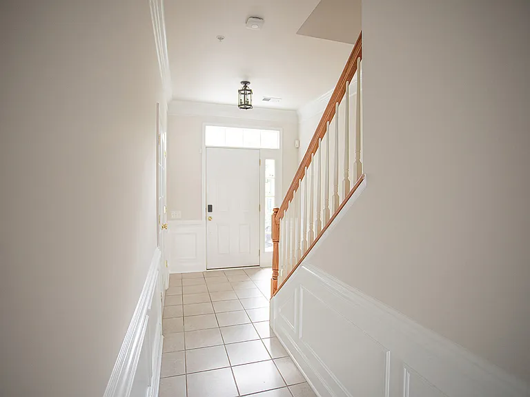Walk-in level - front door on one side of the hallway, garage door is on the other