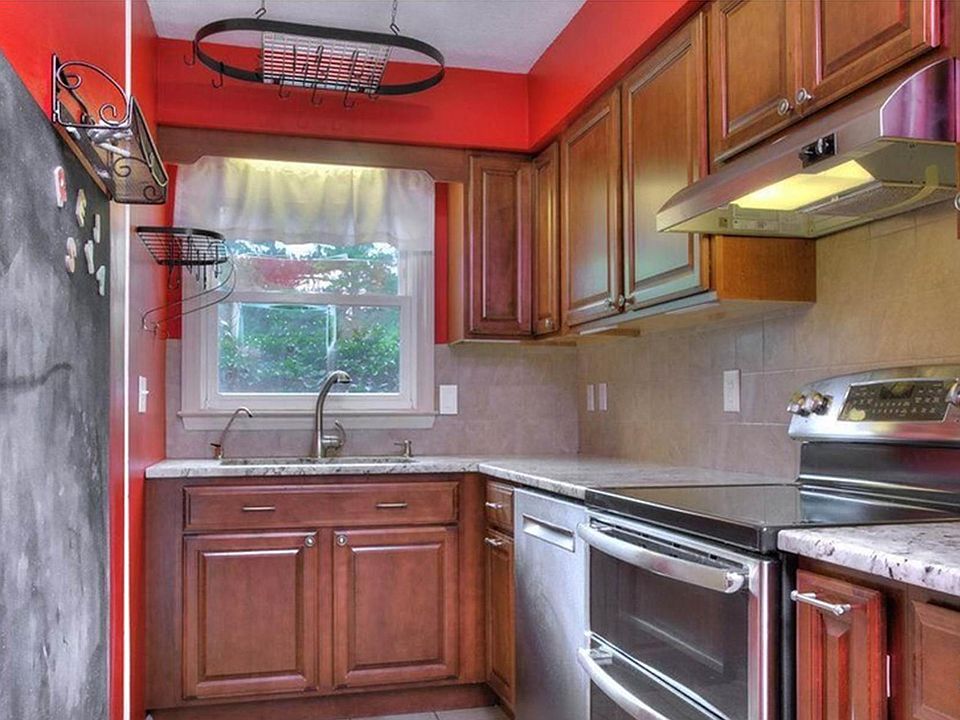 Upscale Kitchen-tile floor, hard surface counter tops , sta