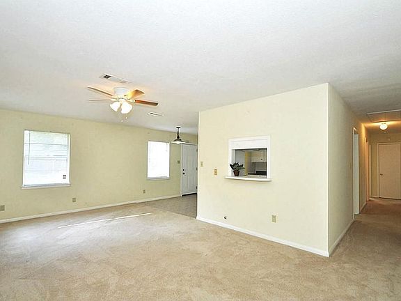 You are now in the den facing the kitchen &, hallway that leads to the bedrooms.