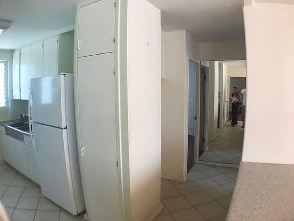 kitchen stainless sink and refrigerator