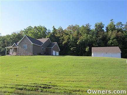 Front Right side and detached garage