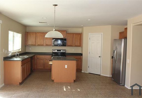 4th image of 43251 W Maricopa Ave