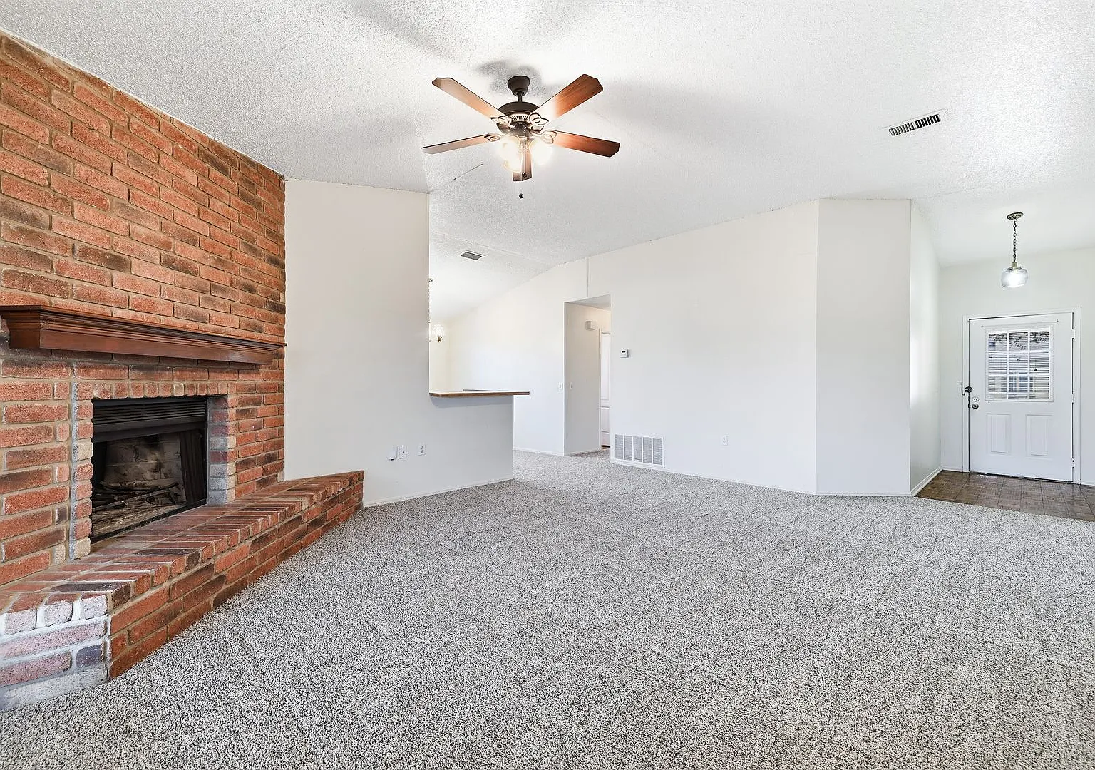 Beautiful Brick-Front Home with Spacious Living Areas & Private Backyard — Photo 4