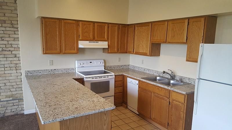 Granite counters in open kitchen