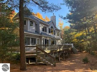 410 S Golden Beach Dr, Kewadin, MI 49648