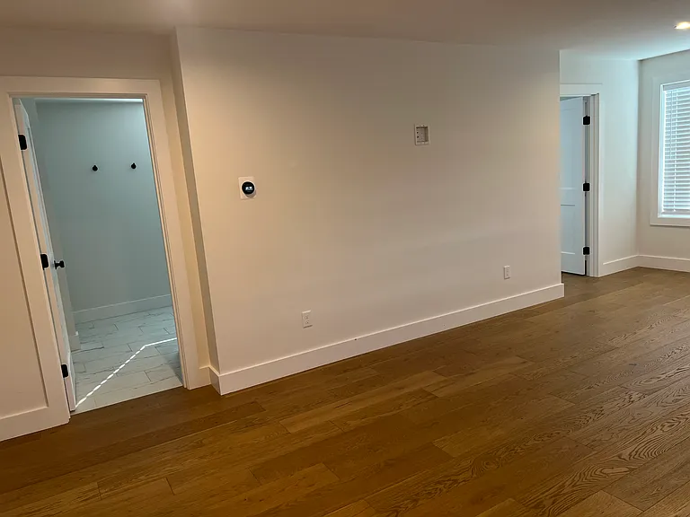 Door on the left is the bathroom, door on the right is the walk in closet