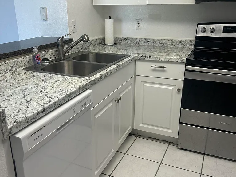 1537 SE Royal Green Cir #E201 — Photo 13