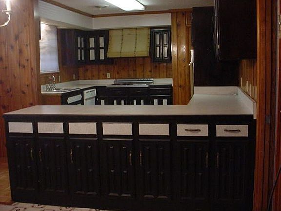 KITCHEN IS LARGE, LOTS OF COUNTER SPACE AND DOUBLE OVENS