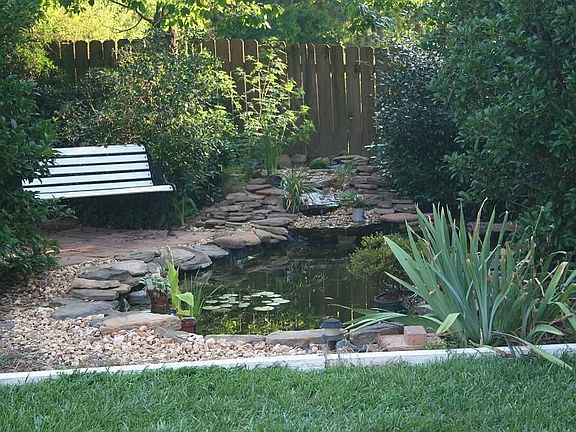 Koi Pond in Fenced Yard