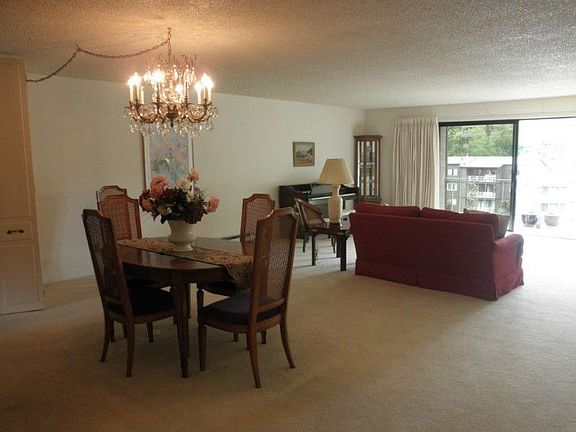 Terrific combined living room and dining area can accommodate large expansive table. Have a grand pi