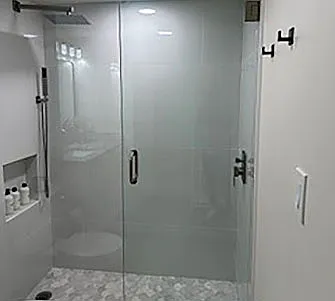 Newly renovated bathroom with rain shower as well as hand held.