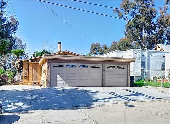 1 Car Garage on the Right with 1 extra parking space