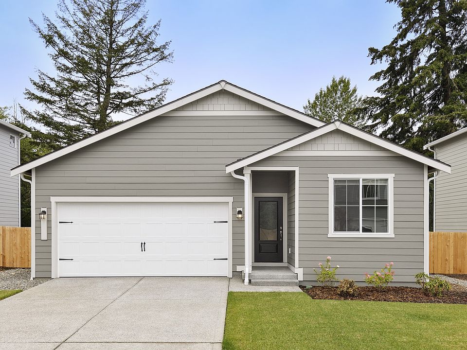 The Columbia is a beautiful single story home with siding.