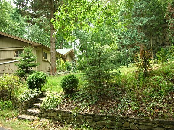 Side yard as seen from lower parking and drive