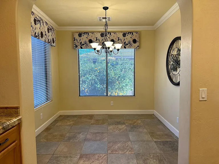 Dining Room with a great view of the backyard and pool.