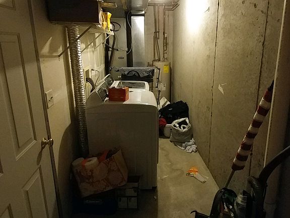 Laundry area with additional storage; w/d hookups