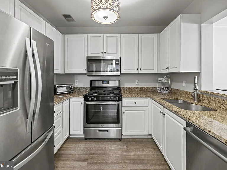 7011 Falls Reach Dr #103 — Photo 5