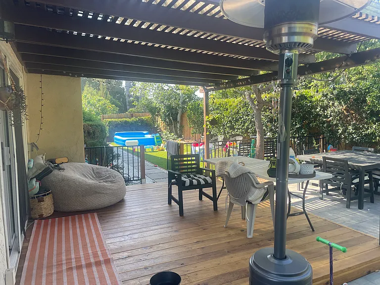New Redwood Deck with Trellis off Living Room with New Sliding Glass Door