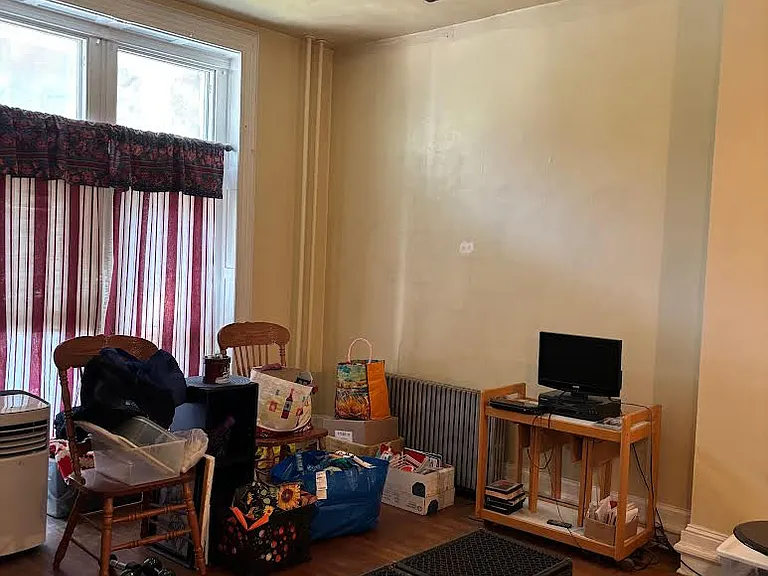 living room with large windows to let a lot of light in.