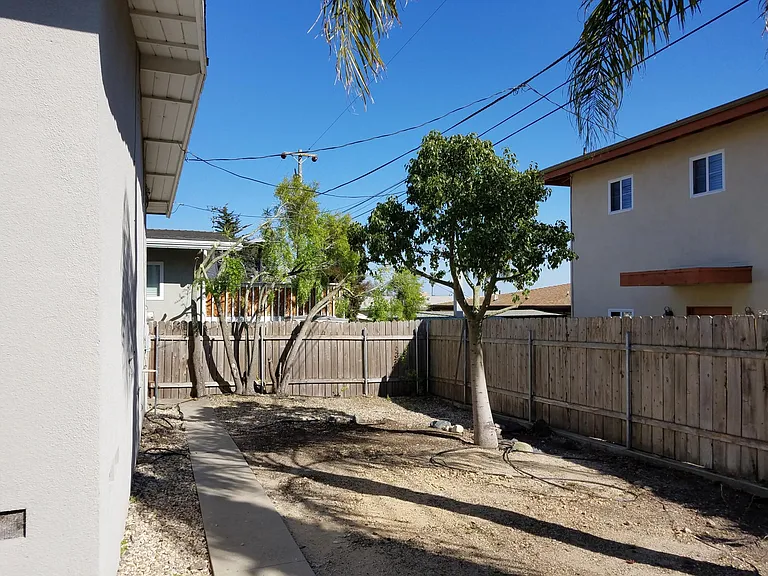Back yard , there is also a patio on one side of house.
