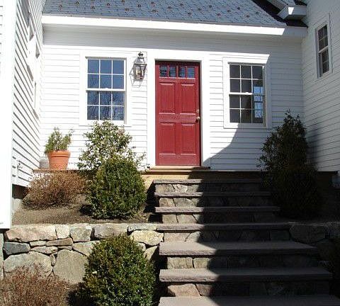 Limestone stairs to main entry door 