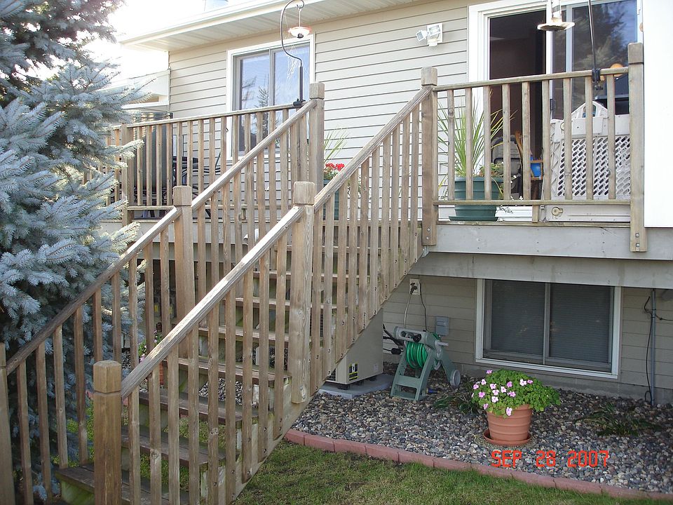Back of house, deck over looking cornfield