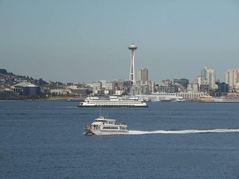 Classic view of Seattle skyline, Space Needle, Ferry & Water Taxi from your living room.