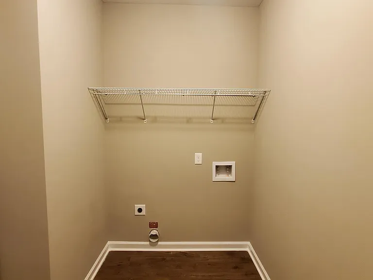 Laundry Room - across the hall from the Master Bedroom