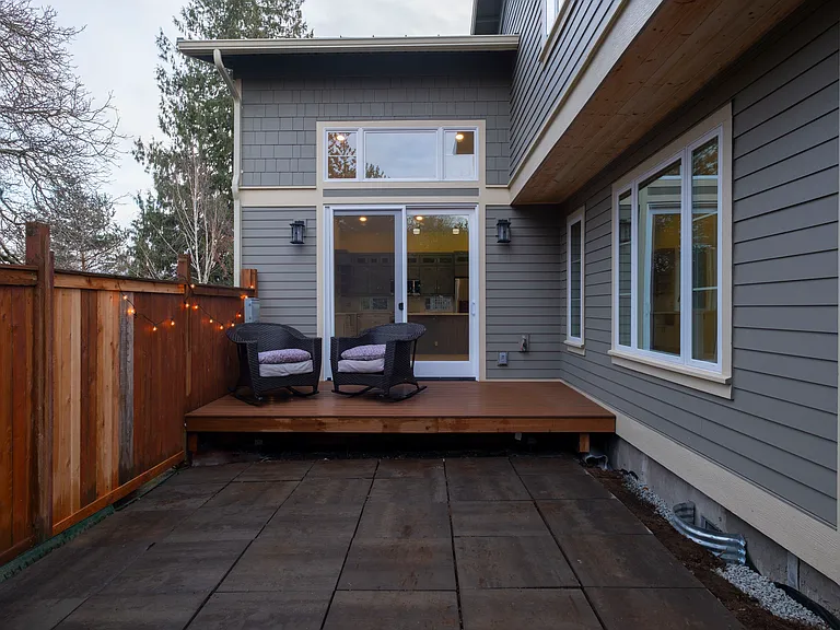 Private yard with sliding door entrance to living area.