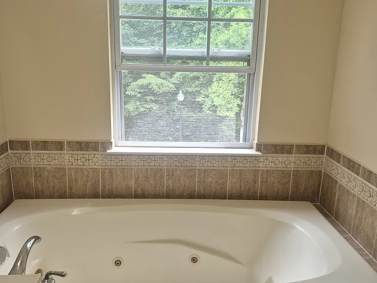 Primary bathroom with jacuzzi