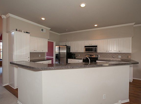 Open Kitchen - Stainless and hardwood