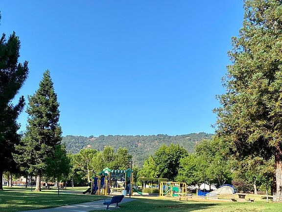 Park touching backyard.
