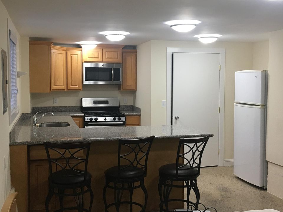 Large kitchen. Lots of counter top space, drawers and cabinets.